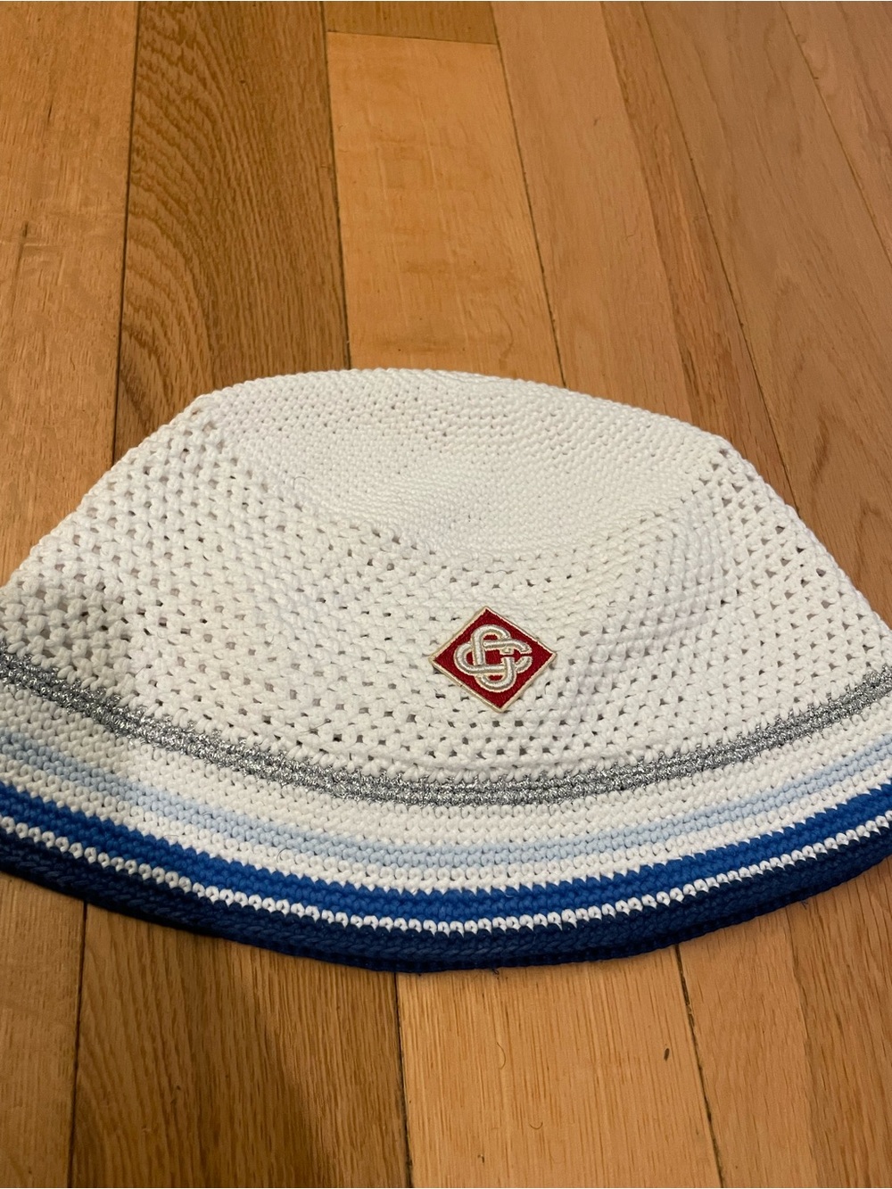 Casablanca White Crochet Bucket Hat with Blue Stripe Accents
